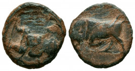 EBUSUS (Ibiza, Islas Baleares). 1/4 Calco. (Ae. 3,28g/18mm). 300-200 a.C. (FAB-923). Anv: Bes con faldellín de frente sosteniendo martillo y serpiente...