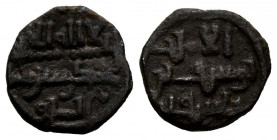 ALMORAVIDES, Yusuf bin Tashfin. Quirate. (Ar. 0,66g/10mm). (Vives 1536; Hazard 895). MBC. Pátina oscura.