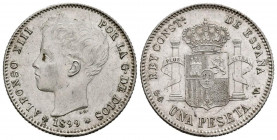ALFONSO XIII (1885-1931). 1 Peseta. (Ar. 4,98g/23mm). 1899 *18-99. Madrid SGV. (Cal-2019-57). MBC+/EBC. Rayas en anverso.