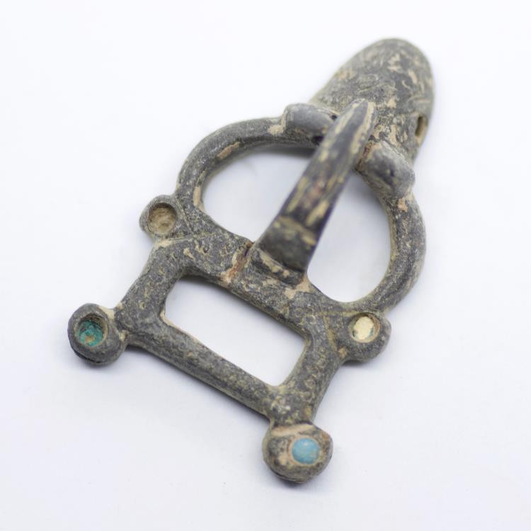 Parthian or Sasanian bronze belt buckle in the shape of Ox, designed with turquo...