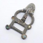 Parthian or Sasanian bronze belt buckle in the shape of Ox, designed with turquoise