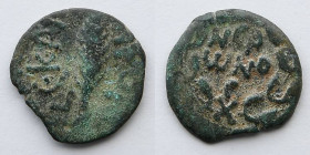 JUDAEA: Porcius Festus Procurator, under Nero, AD 58/59, AE Prutah, 1.8g. Obverse: Palm branch. Reverse: Legend in wreath. Hendin IV 653.