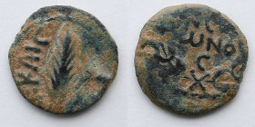 JUDAEA: Porcius Festus Procurator, under Nero, AD 58/59, AE Prutah, 1.7g. Obverse: Palm branch. Reverse: Legend in wreath. Hendin IV 653.