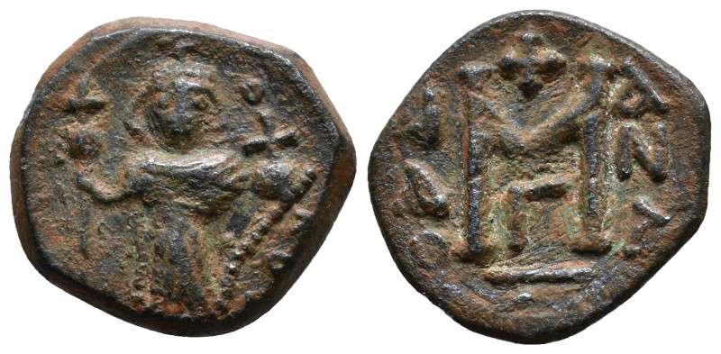 Arab-Byzantine, c. 660s-680s. Æ Fals 5,35g