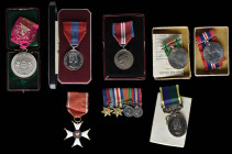Miscellaneous Medals and Awards, comprising: A WW2 Defence and War Medal Pair addressed to ‘A/Sqn. Ldr. M. I. Mason’ of Folkestone Kent (research sugg...