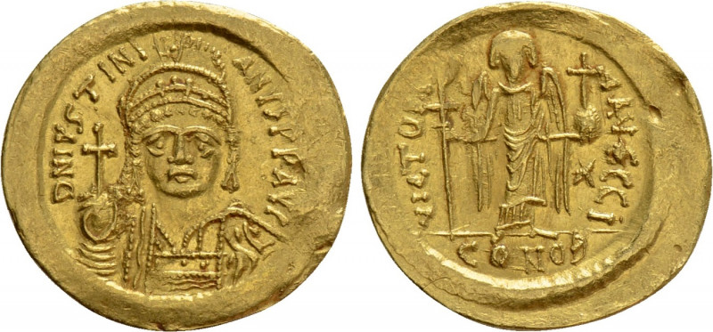 JUSTINIAN I (527-565). GOLD Solidus. Constantinople. 

Obv: D N IVSTINIANVS P ...