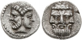 CILICIA. Uncertain. 4th century BC. Obol (Silver, 9 mm, 0.82 g, 1 h). Janiform head; on the left, a bearded male; on the right, a diademed female. Rev...