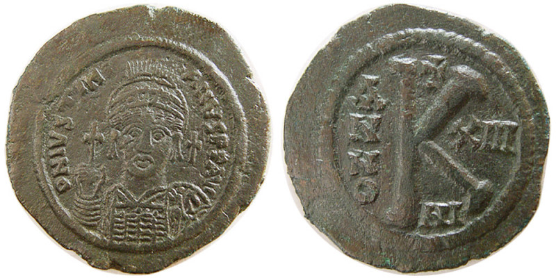 BYZANTINE EMPIRE. Justinian I. AD. 527-565. Æ 1/2 Follis (10.91 gm; 31 mm). Nico...