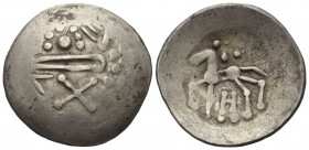 Ostkelten. Muntenien. Typ 'Sattelkopf'.

 Tetradrachme (Silber).
Vs: Stark stilisierter Kopf des Zeus mit Lorbeerkranz rechts.
Rs: Stark stilisier...
