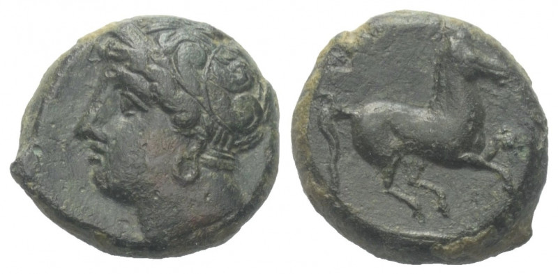 Sizilien. Sikulo-punische Prägungen.

 Bronze. Ca. 375 - 350 v. Chr.
Vs: Kopf...