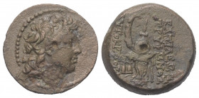 Seleukidisches Königreich. Tryphon (142 - 138 v. Chr.).

 Bronze.
Vs: Kopf mit Diadem rechts.
Rs: Makedonischer Helm mit Hörnern links, davor zwei...