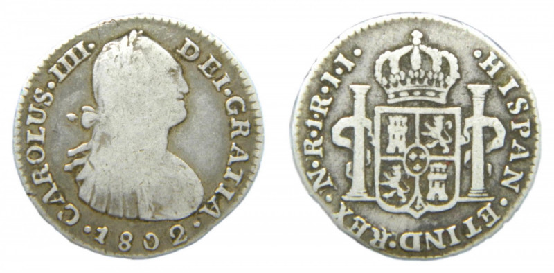 Carlos IV (1788-1808). 1 real 1802 JJ. Nuevo Reino. AC 499. Muy rara.
bc+