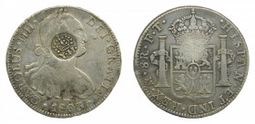 Isabel II (1833-1868). Resello Y II de Manila ,en 8 reales de Carlos IV 1803 ceca de mexico. 26,88 gr Ar
mbc
