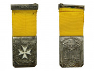 SANIDAD MILITAR, DAMAS AUXILIADORES 1940. Distinción por servicios a hospitales, medalla rectangular 40x30 mm. (HG883)
ebc