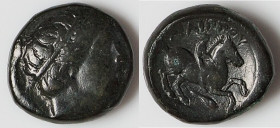 MACEDONIAN KINGDOM. Philip II (359-336 BC). AE unit (17mm, 6.90 gm, 12h). Choice VF. Uncertain mint in Macedonia. Head of Apollo right, wearing taenia...