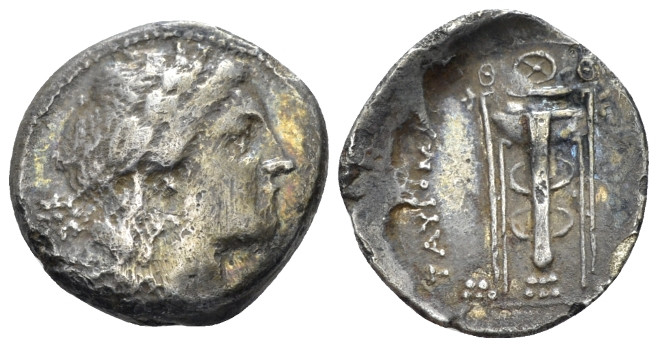 Sicily, Tauromenium Drachm circa 304-289, AR 16.00 mm., 2.97 g.
Laureate head o...