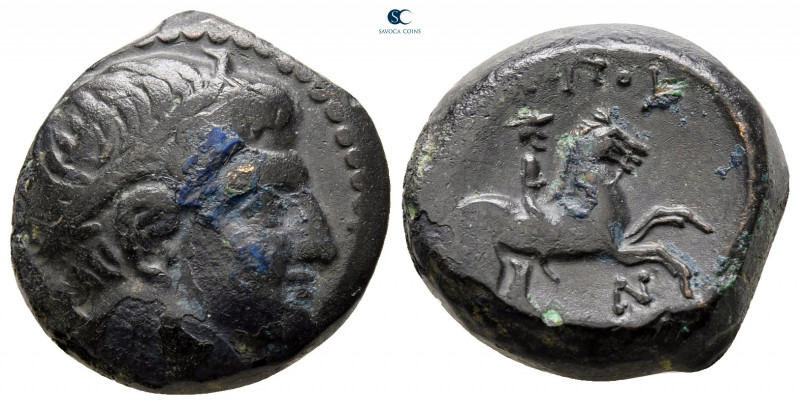 Kings of Macedon. Uncertain mint. Philip II of Macedon 359-336 BC. 
Bronze Æ
...