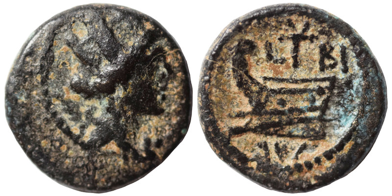PHOENICIA (?). Ae (bronze, 1.91 g, 14 mm). Tyche, to right. Rev. Prow to left, d...