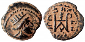 BABYLONIA. Seleukeia ad Tigrim. Circa first century AD. Ae (bronze, 1.72 g, 11 mm). Turreted bust of Tyche to right. Rev. Monogram; BOVΛHC (?) around,...