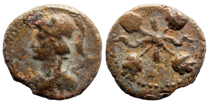 GREEK. Ae (bronze, 1.76 g, 14 mm). Helmeted bust, left. Rev. Four poppy (?) ears...