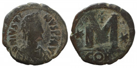 Justin I, 518-527. Follis (bronze, 15.38 g, 31 mm), Constantinople. DN IVSTINVS PP AV Diademed, draped, and cuirassed bust right. Rev. Large M; cross ...
