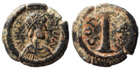 Justin I, 518-527. Dekanummium. (bronze, 2.04 g, 17 mm), Constantinople. D N IVSTINO P P AV, diademed, draped and cuirassed bust to right. Rev. Large ...