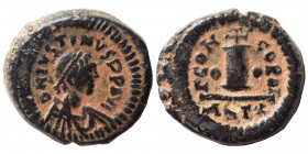 Justin I, 518-527. Dekanummium (bronze, 4.28 g, 16 mm), Antioch. D N IVSTINVS P P AVG Diademed, draped and cuirassed bust of Justin I to right. Rev. Γ...