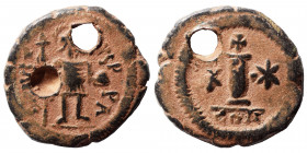 Justin II, 565-578. Dekanummium (bronze, 5.31 g, 21 mm), Constantinople. D N IVSTINVS P P AVG Justin II, in military attire, standing front, head to r...