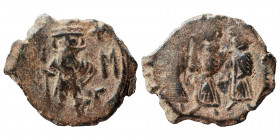 Constans II, with Constantine IV, Heraclius, and Tiberius, 641-668. Follis (bronze, 2.23 g, 20 mm), Constantinople. Constans II standing facing, in mi...