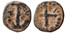 CRUSADERS? Uncertain, 12/13th century. Ae (bronze, 1.24 g, 13 mm). Anchor (?). Rev. Cross within pelleted border. Cf. Zeus, Web Auction 18, lot 772. V...