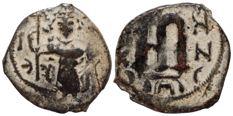 Arab-Byzantine, Umayyad Caliphate, circa AD 641-660. Fals (bronze, 3.46 g, 19 mm...