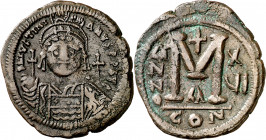 (542-543 d.C.). Justiniano I. Constantinopla. Follis. (Ratto 513) (S. 163). Ex Áureo 27/04/2000, nº 1109. 20,28 g. MBC.