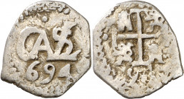 1694. Carlos II. Potosí. 1/2 real. (AC. 183). Doble fecha, la del reverso parcialmente visible. 1,40 g. MBC.