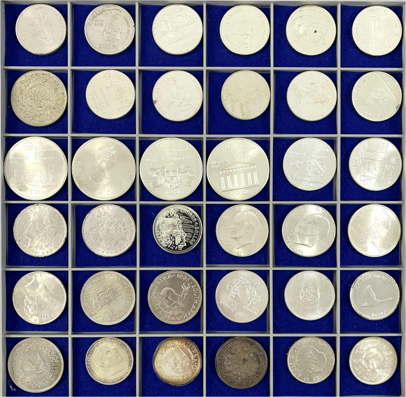 Sammlungen allgemein
Schuber mit 36 Silbermünzen aus aller Welt. 19. und 20. Jh...