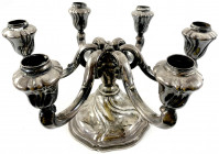 Silber
Sechsarmiger Kerzenleuchter, Silber 835/1000. Durchmesser 30 cm; 1095,3 g. Bodenplatte Metall versilbert, Sockel gefüllt
