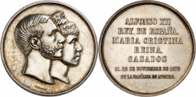 1879. Alfonso XII. Matrimonio del rey con doña María Cristina de Habsburgo. Medalla. (Ruiz Trapero 861-862) (V. 486) (V.Q. 14400 var metal). Grabador....