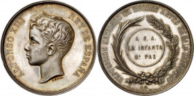 1895. Alfonso XIII. Madrid. Exposición Nacional de Bellas Artes. Medalla. (V. 571 var metal). Grabador: B. Maura. Muy bella. Pátina irisada. Plata. 63...