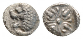 Greek
IONIA, Miletos (Circa 520-450 BC)
AR hemiobol (6.9mm, 0.2g)
Obv: Forepart of lion right, head left.
Rev: Stellate pattern in square incuse punch...