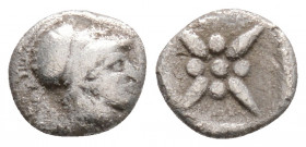 Greek
IONIA, Uncertain (Circa 5th century BC)
AR Hemiobol (7.8mm, 0.3g)
Obv: Head of Athena (?) to right, wearing Corinthian helmet.
Rev: Star of eigh...