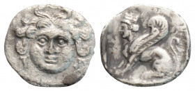 Greek
CILICIA, Uncertain mint (Circa 4th century)
AR Obol (10.3mm, 0.6g)
Obv: Facing gorgoneion.
Rev: Sphinx to left. 
SNG BnF 479; Göktürk 48; SNG Le...