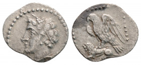 Greek
CILICIA, Uncertain (Circa 4th century BC)
AR Obol (12mm, 0.6g)
Obv: Youthful male head left, wearing grain wreath.
Rev: Eagle, with wings spread...