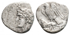 Greek
CILICIA, Uncertain (Circa 4th century BC)
AR Obol (11mm, 0.5g)
Obv: Youthful male head left, wearing grain wreath.
Rev: Eagle, with wings spread...
