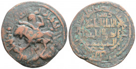 Medieval
Islamic
Begtiginids. Irbil. Muzaffar ad-Din Kökburi (AH 563-630/ 1368 - 1233 AD)
AE Dirhem (32.8mm 10.2g)
Obv: Male figure with knife on lion...