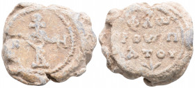 Byzantine Lead Seal ( 6th century)
Obv: Cruciform monogram
Rev: 3 (three) lines of text.
(24 g, 31,2 mm diameter)