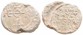 Byzantine Lead Seal ( 6th century)
Obv: Cruciform monogram
Rev: 4 (Four) lines of text.
(11,9 g, 24,9 mm diameter)