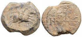Byzantine Lead Seal (7th- 8th centuries)
Obv: Uncertain saint riding on horseback to right
Rev: Cruciform monogram
(19,2 g, 22,9 mm diameter)
