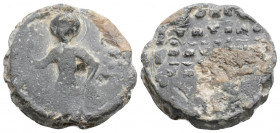 Byzantine lead seal. (7th-9th centuries).
Obv: Uncertain Saint
Rev : 5 (Five) lines text
(7,5g 20,9mm diameter)