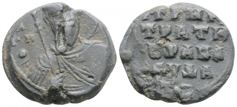 Byzantine Lead Seal (11th Century)
Obv: St. frontal, halo. He is holding a spear...