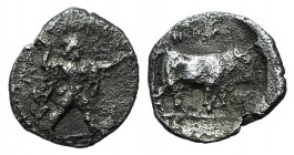 Northern Lucania, Poseidonia, c. 410-350 BC. AR Obol (9mm, 0.29g, 9h). Poseidon wielding trident r.; branch to l. R/ Bull standing r.; branch below. H...