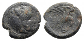 Bruttium, Kroton, c. 350-300 BC. Æ (20mm, 6.70g, 6h). Head of Herakles r., wearing lion skin; ΔI above. R/ Eagle r., alighting on snake. HNItaly 2217;...